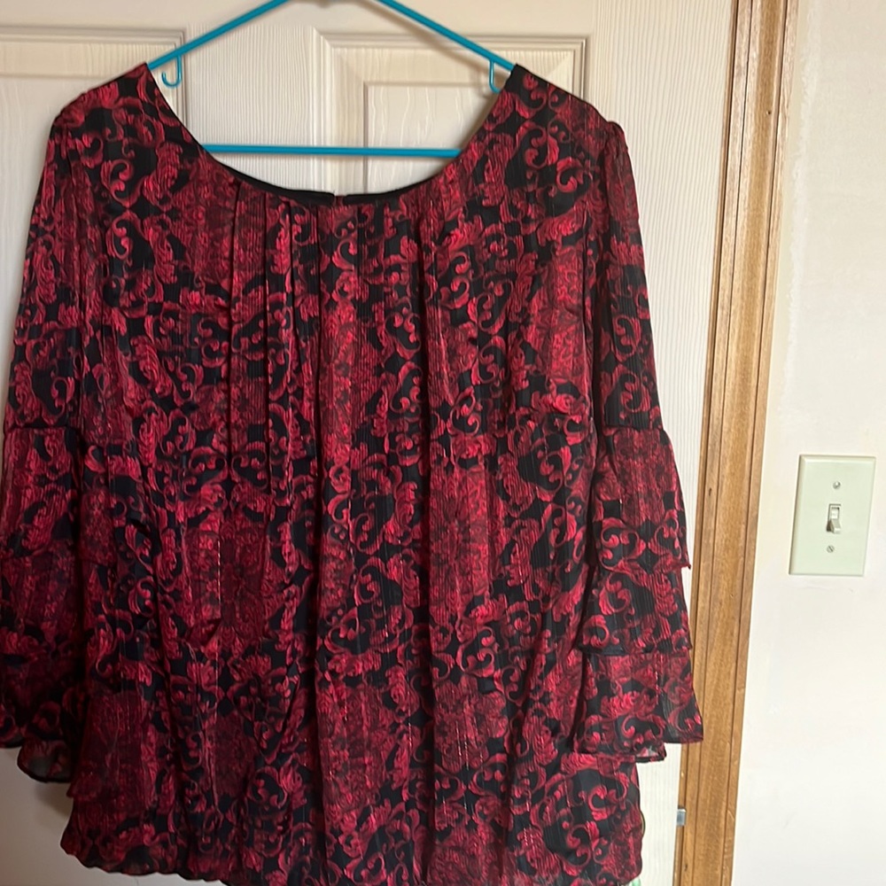 Woman’s black and red blouse!  Very pretty